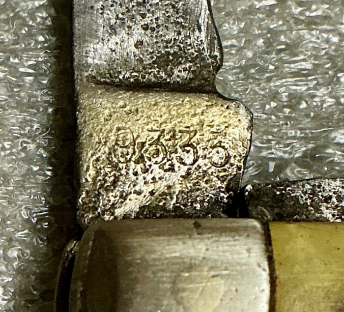 The Main Blade Back (worn) Tang Stamp.