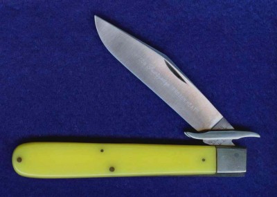 Robeson 812872 4 1/2" Yellow Composition Handled<br />Folding Hunter w Folding Guards. Hollow Grind. Etched.