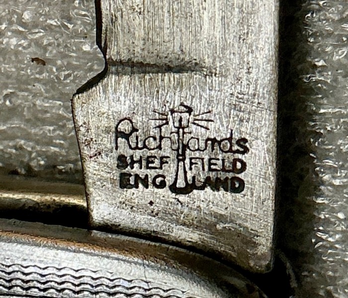 The Bowl Scraper Front Tang Stamp.
