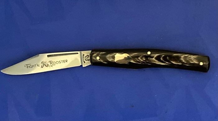 Single blade, buffalo horn gunstock, assembled from leftover parts.