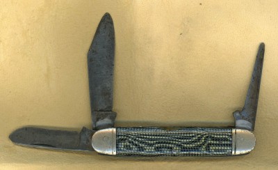 Camillus 4-line snake skin b.jpg