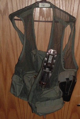 SRU vest with attached sheath and holster