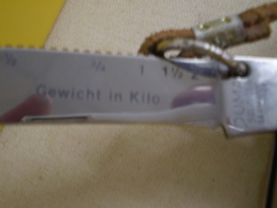 PumaFishKnifeetch&tangstamp.jpg